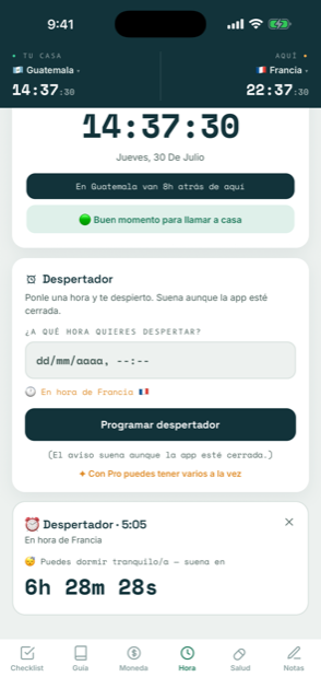 Pantalla de Hora de Tornaviaje: doble reloj de casa y destino, y el despertador